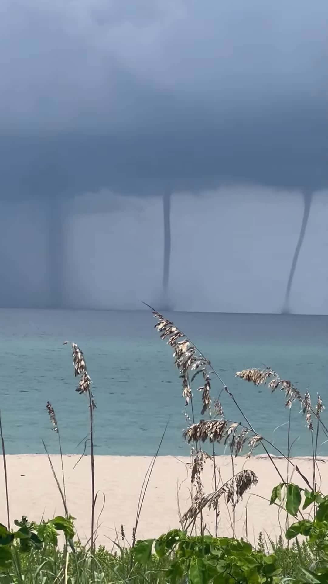 Cover for #FirstVideoChallenge Tornadolike Waterspouts Observed from Shore.