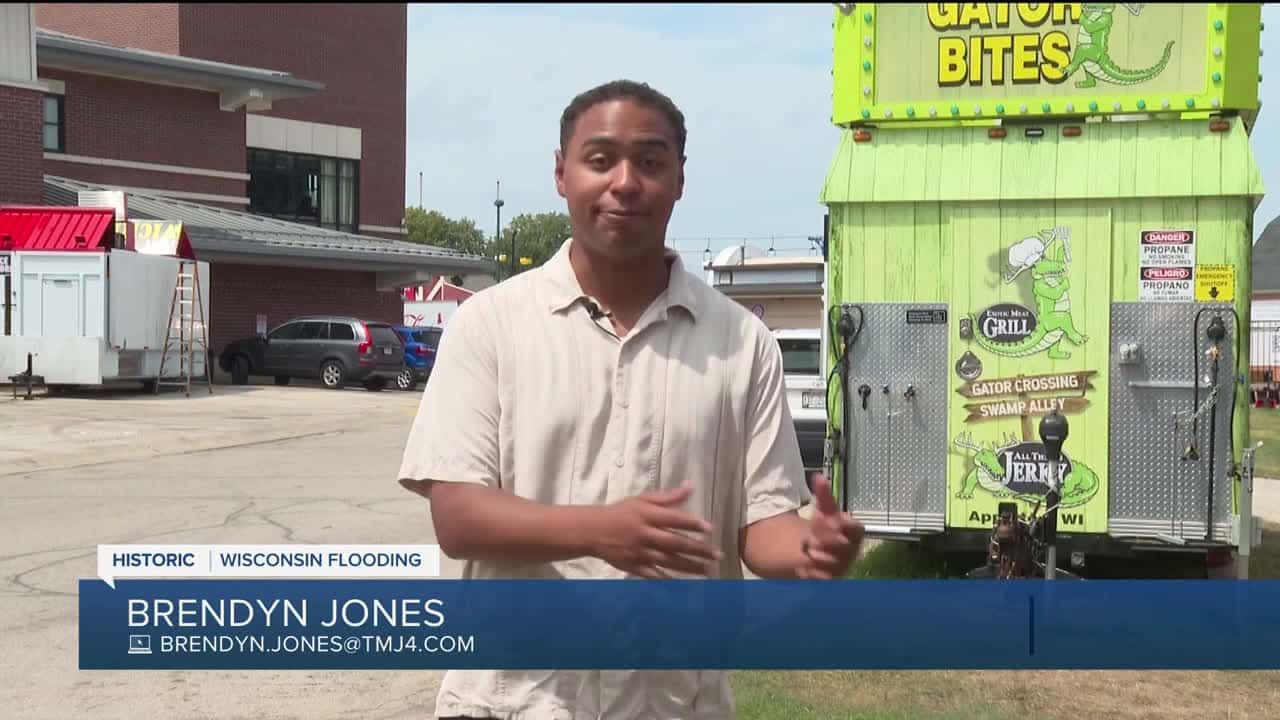 Cover for State fair vendors count losses after flooding turns fairgrounds into 'lake'