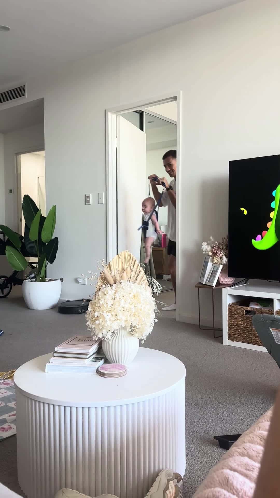 Cover for Dad and baby are recreating a Pink concert for mom