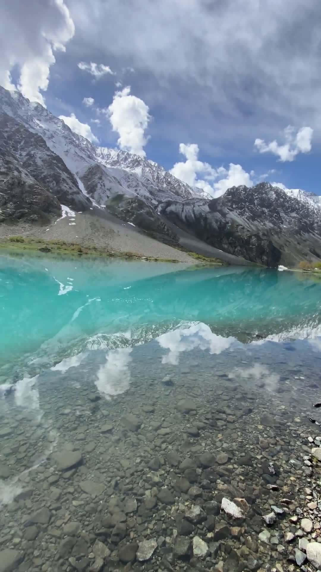 Cover for Exploring the breathtaking beauty of Baha Lake in Gilgit, Pakistan 🌊✨ #Pakistan #TravelGoals #NatureLovers