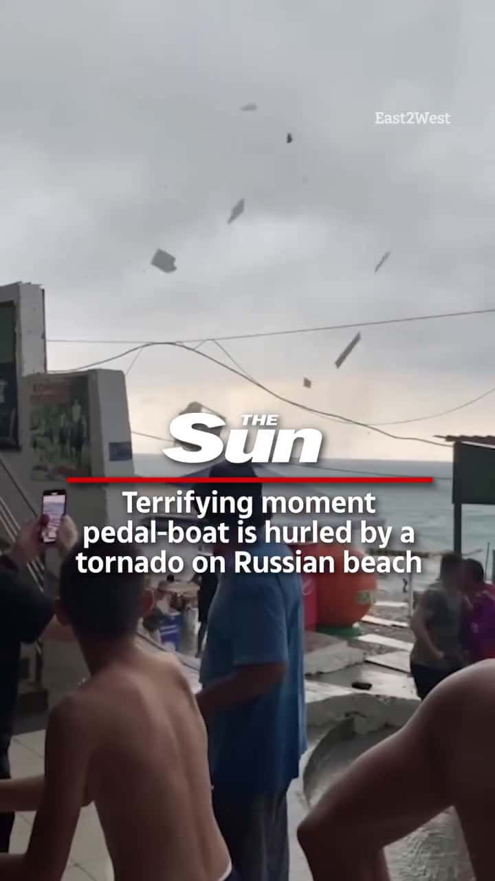 Cover for Tornado at a beach in Russia picks up a boat hurls it through the air...