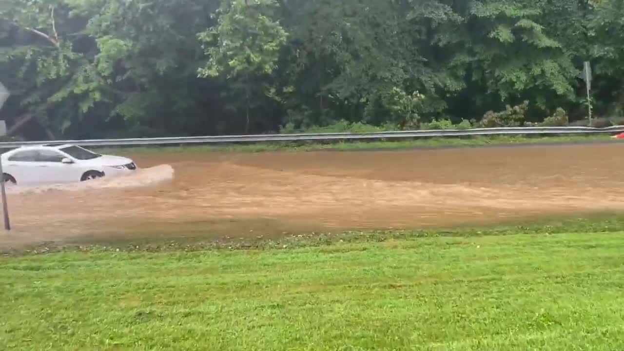 Cover for Multiple Cars Stranded as Flash Flooding Hits Washington Suburb