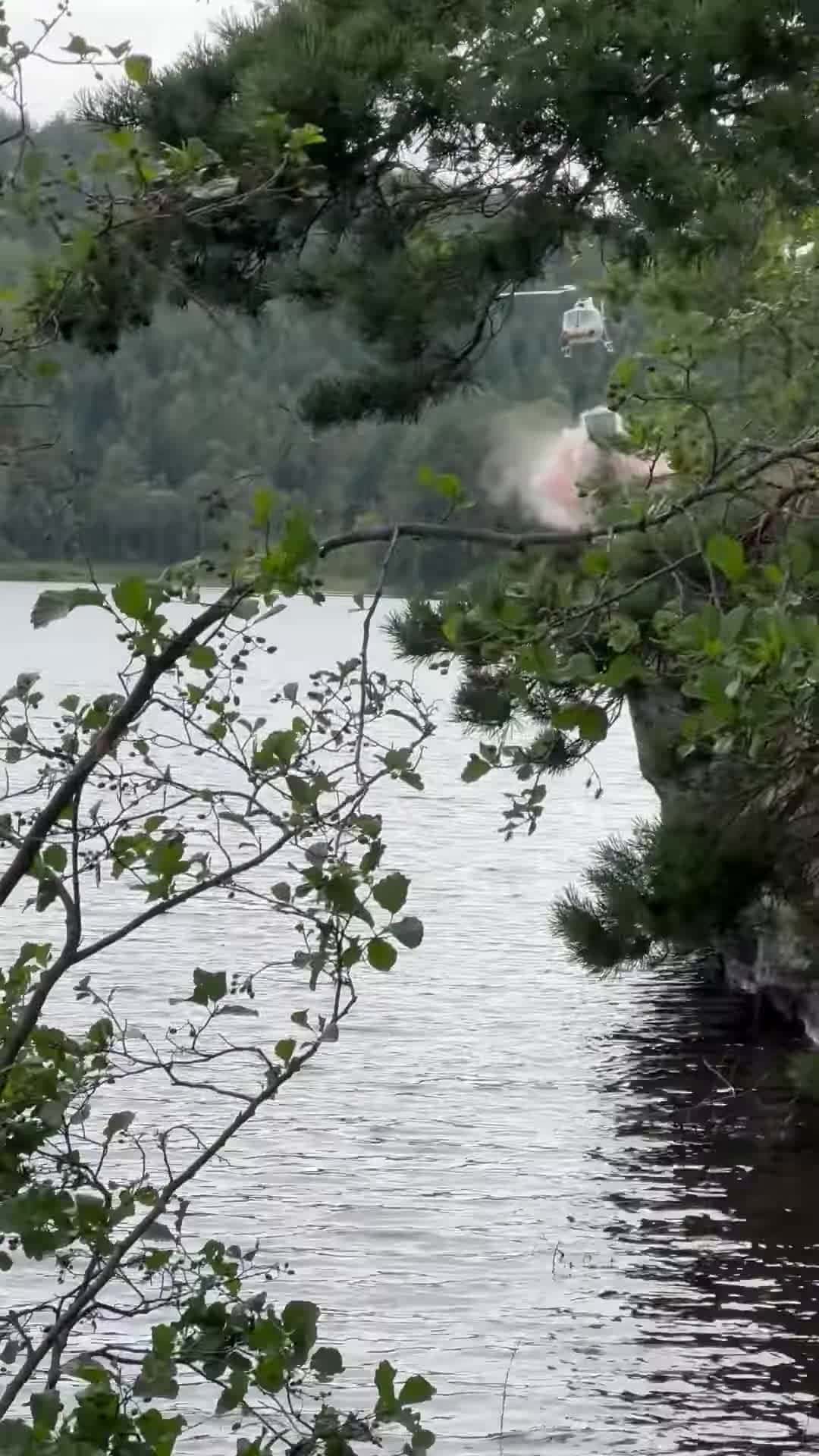 Cover for #CaughtOnCamera Helicopter Dropping Retardant Close to Vacationgoers.