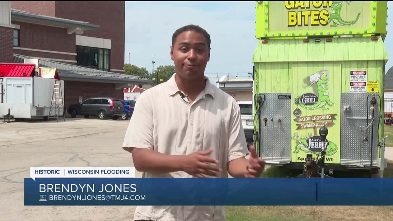 Cover for tate fair vendors count losses after flooding turns fairgrounds into 'lake'