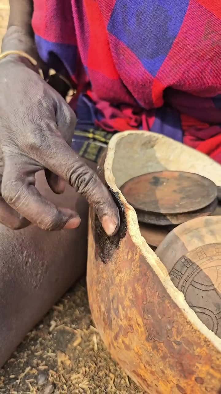 Cover for __The labial plate carries profound social and cultural significance for Surma women. 