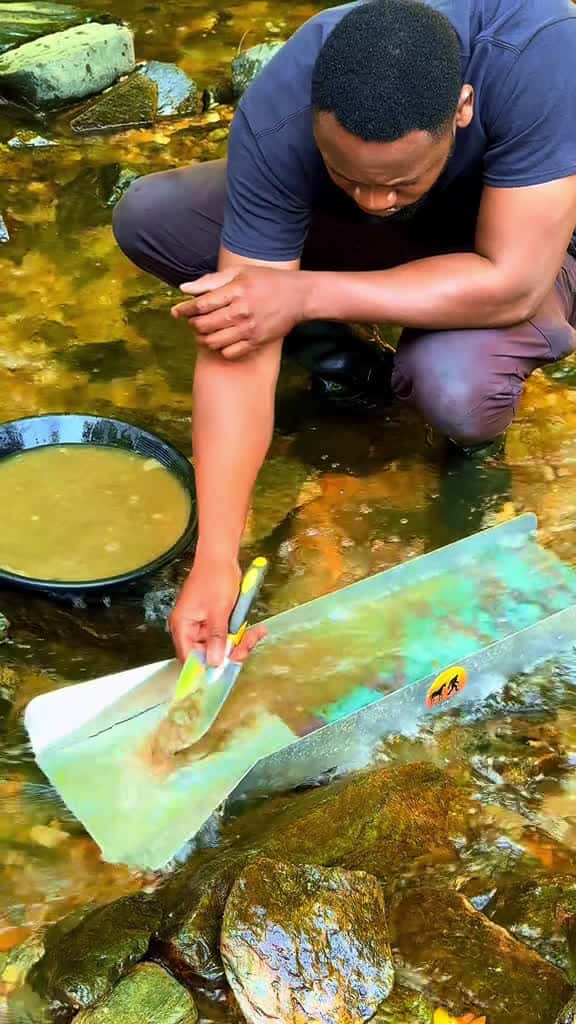 Cover for Sluicing for gold wusing a Dream Mat sluice #gold #goldmining #goldprospecting #goldrush  created by Mini prospector with Mini prospector’s original sound - Mini prospector