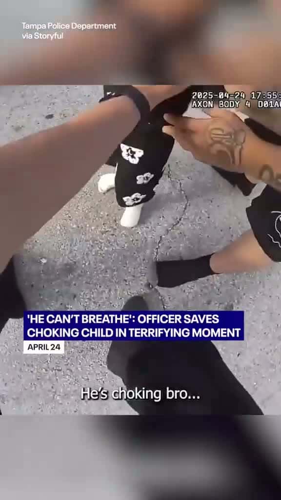 Cover for Policemen helping a choking toddler captured on body camera footage.
