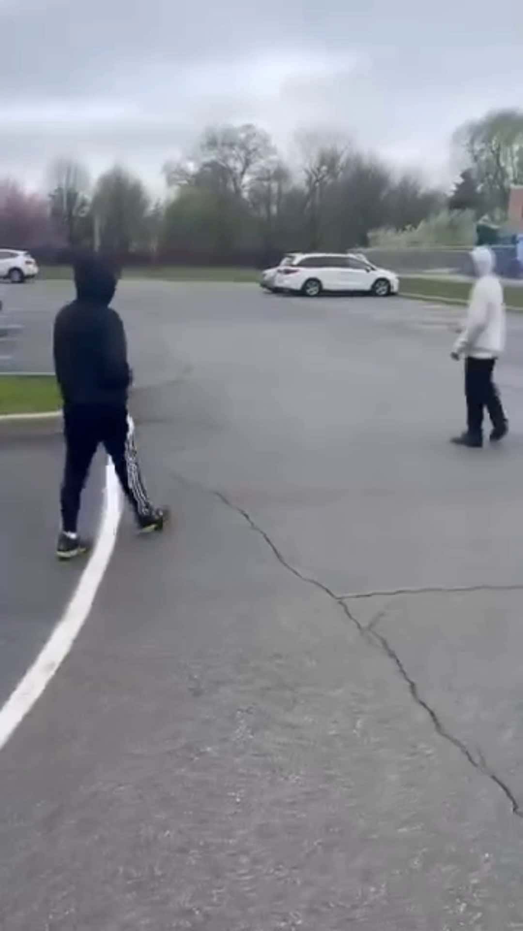Cover for a fight at a park's parking lot
