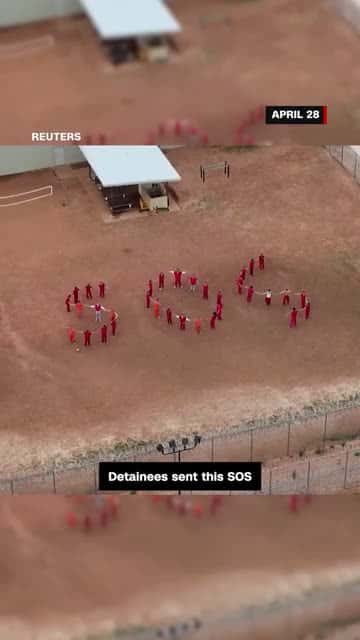 Cover for Detainees signal 'SOS' at immigrant dete
