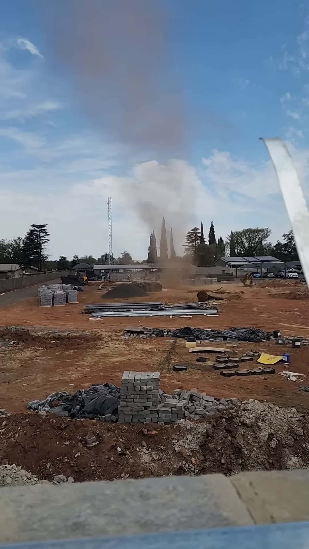 Cover for #FirstVideoChallenge Dust Devil Hits Construction Site Without Causing Damage.