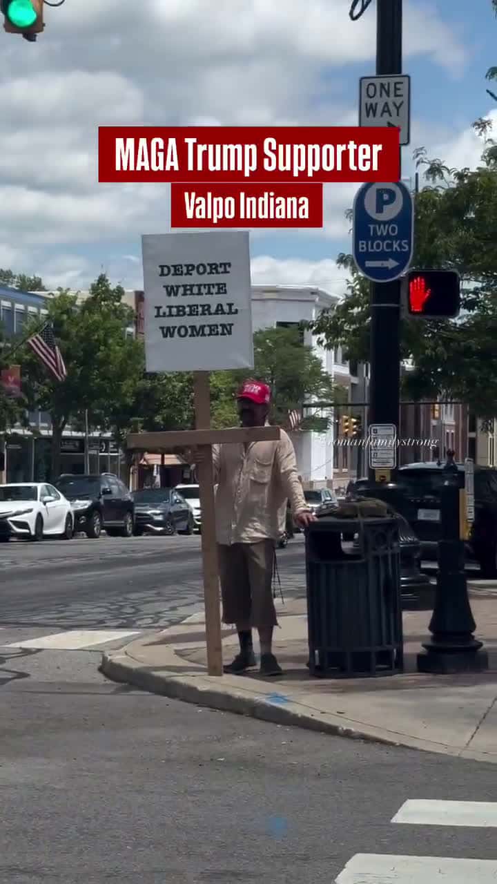 Cover for MAGA Supporter Trolls Protesters in Indiana With Sign: “Deport White Liberal Women”