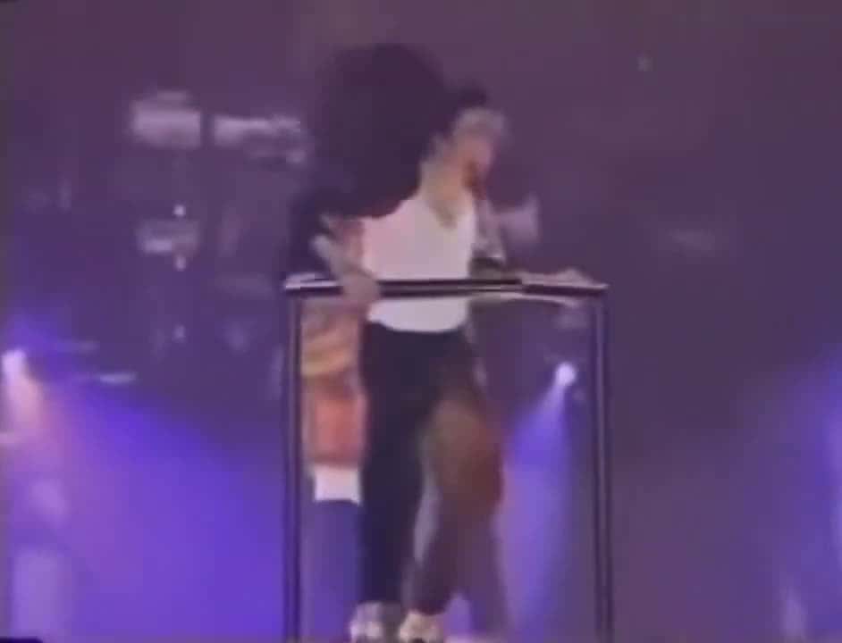Cover for Micheal jackson holding fan while performing live #pop #music #live #michealjackson #fyp #scoopz 