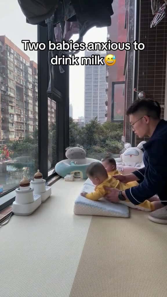 Cover for See how dad takes care of two babies. foryou fyp funny funnyvideos baby 69070 #trendingscoopz