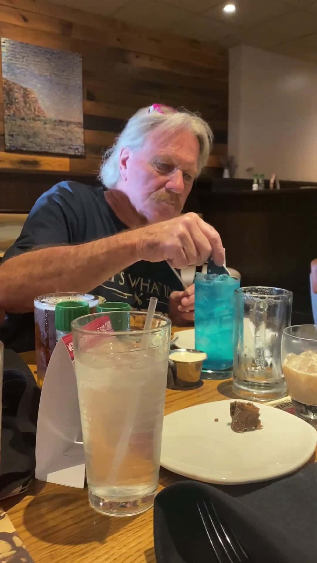 Cover for Dad enjoys dinner and an Aussie JAWSie drink at Outback Steakhouse for Fathers Day