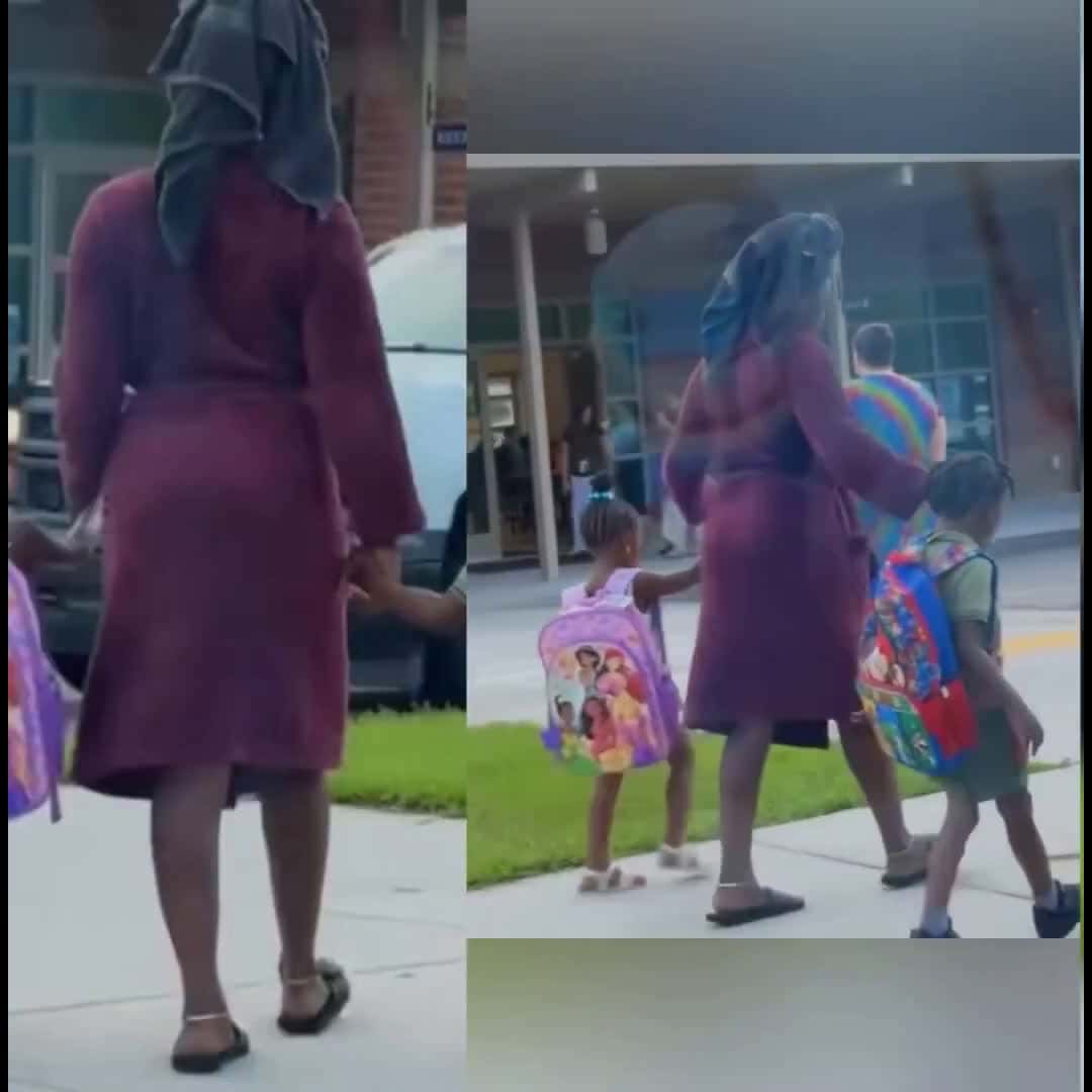 Cover for #firstvideochallenge  A mother is  facing backlash for wearing a robe and a towel wrapped around her head to drop off her kids at school. Are people overreacting to viral video? 👘🤔 #explore #fyp #follow