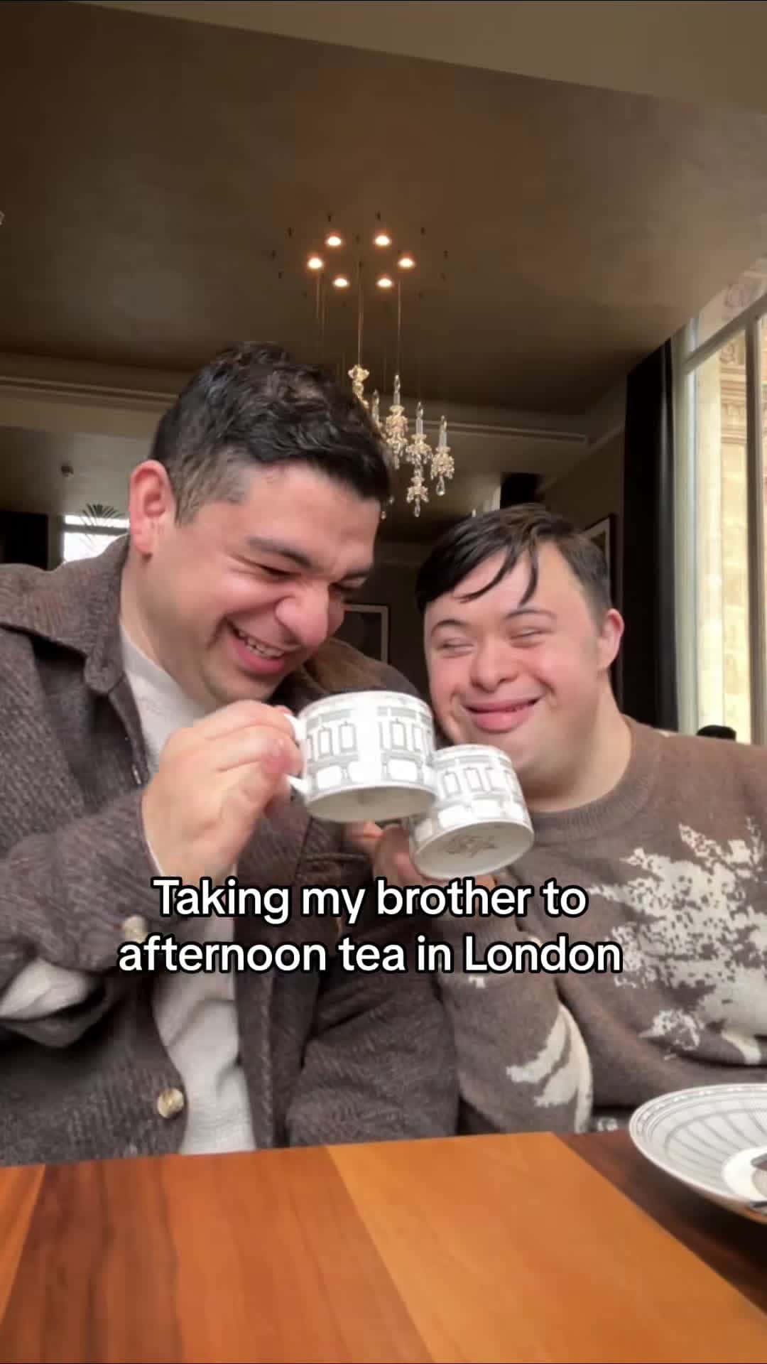 Cover for A hug in a cup 😂💛 #afternoontea #london #teaparty #downsyndrome #brotherlove #wholesome #family #teafortwo