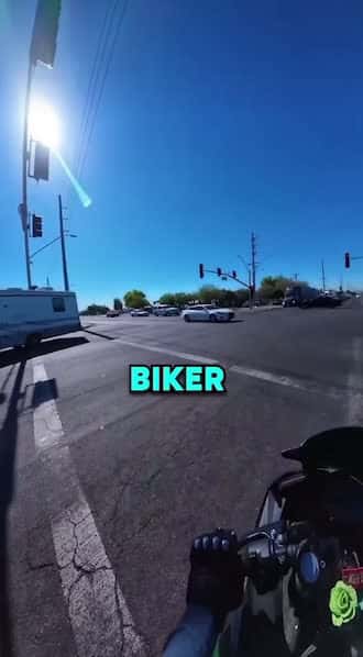 Cover for While riding on the road a biker realized the truck behind him was getting dangerously close causing him to panic. After shouting to back off the trucker finally noticed the situation. What happened next turned out surprisingly different than expected — and it was all caught on camera.