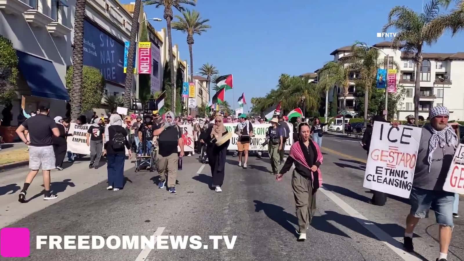 Cover for “No Peace On Stolen Land”NOW: LAPD in vehicles and helicopter follow Pro-Palestine protesters as they march past The Grove and through the streets of Los Angeles, California.Video by Ken Lopez (Desk@FreedomNews.TV to license)