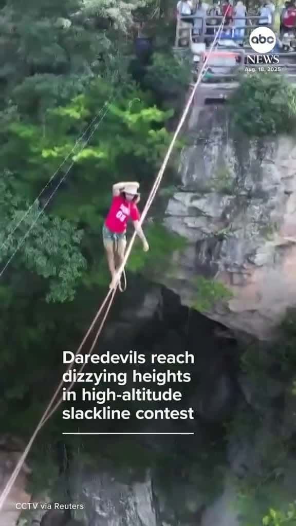 Cover for A terrifying high-altitude slackline contest has kicked off in China, where elite slackliners from around the world are vying for the championship title. Competitors walk on a slackline less than an inch thick, which is suspend...