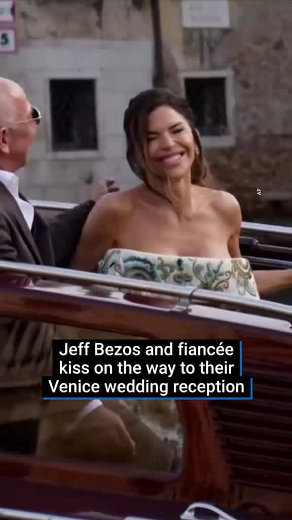 Cover for Amazon founder Jeff Bezos and Lauren Sánchez shared a kiss in a water taxi on the way to their Venice reception, ahead of their wedding at the weekend. #jeffbezos #venice #italy #laurensanchez