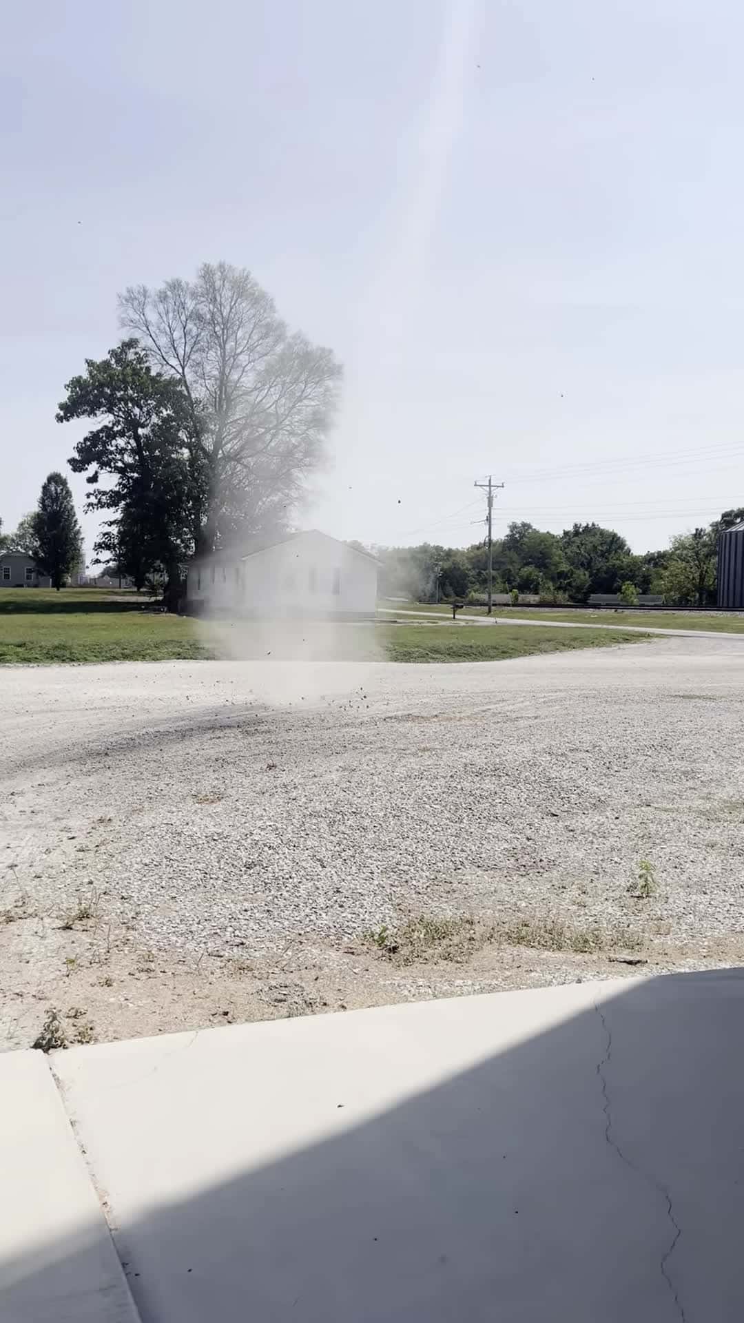 Cover for #FirstVideoChallenge Dust Devil Spirals Across Farm Lifting Dust and Debris