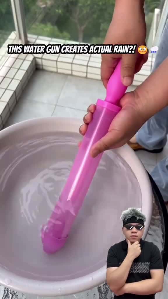 Cover for This Water Gun Makes Rain  fyp ManofHacks tiktok watergun 10317 #american