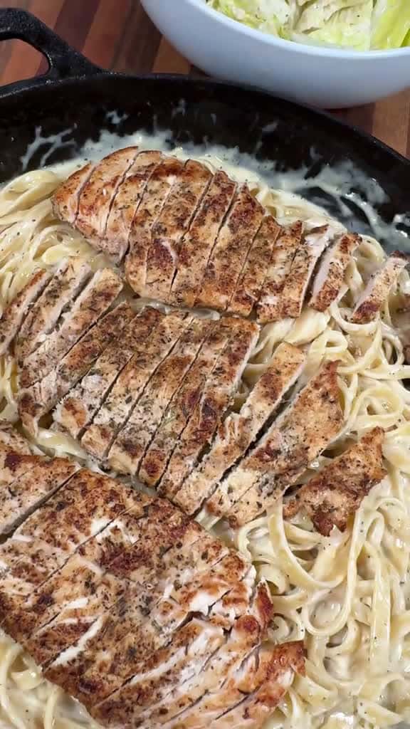 Cover for You don’t gotta be ballin to have chicken Alfredo for dinner, it’s cheap and easy to make it at home! INGREDIENTS  10 oz fettuccini 1 lb of chicken breast 1/2 tsp Salt and Pepper 1 tsp Garlic Powder and Italian Seasoning  2 tbs...