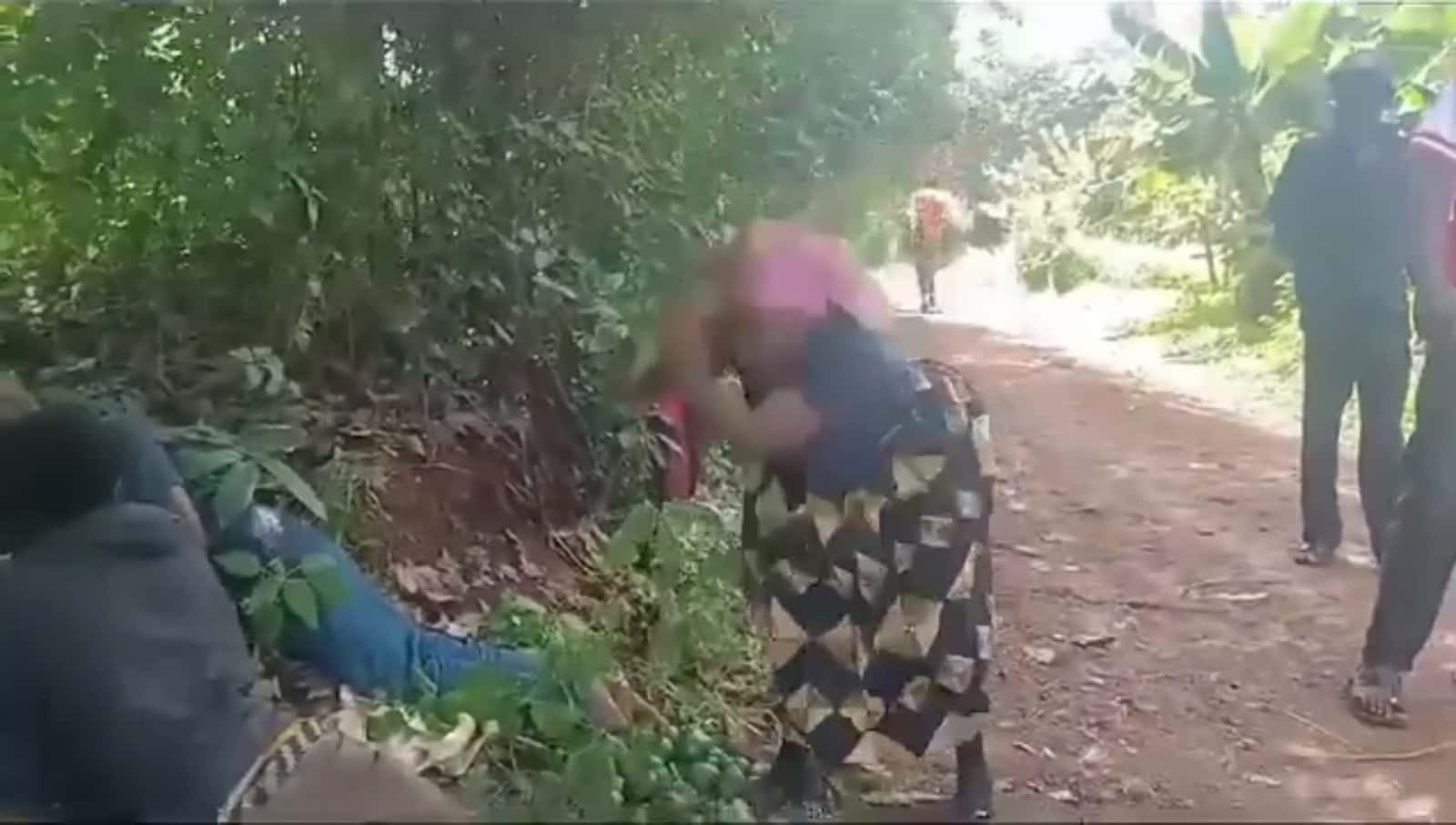 Cover for An African mom beats her two Drunkards son while the their father watches 
