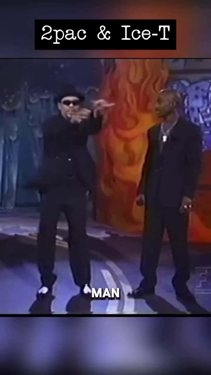 Cover for When Legends Collide: Ice-T and Tupac Share the Stage in a Rare, Raw MomentIn a powerful flashback to the early ‘90s, a rare video clip captures two iconic voices of hip hop — Ice-T and Tupac Shakur — on stage together, delivering raw energy and unapologetic truth. #fyp #ingodwetrust