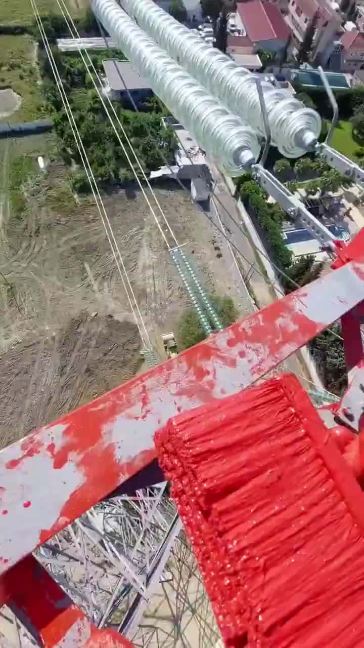 Cover for Just another day painting a transmission tower