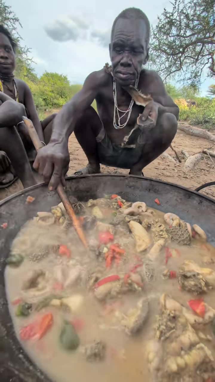 Cover for Wow,,!!😯 that's incredible delicious🤤😋See Traditional food bushmen hadza Hunters Enjoying eat Lunch#africa #animals