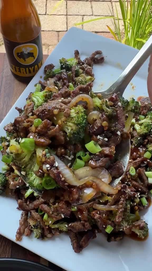 Cover for Griddle Teriyaki Steak and Broccoli is easy to make and perfect for an easy dinner or meal prep!  INGREDIENTS 1 1/2 lbs NY Strip Steak, sliced  16 oz broccoli florets  1 onion, sliced  Olive oil Salt, pepper, garlic powder  Ste...