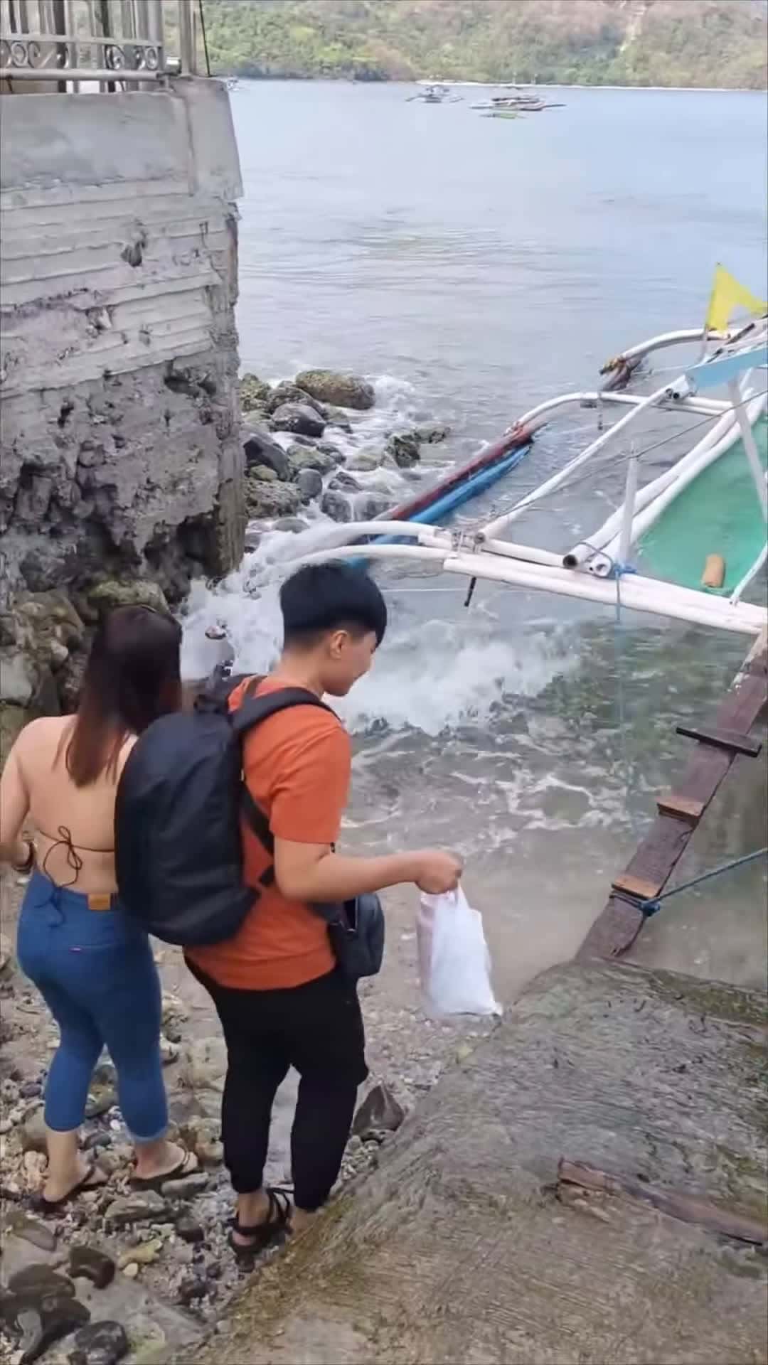 Cover for #CaughtOnCamera Guys Slip on Rock Before Boarding Boat.
