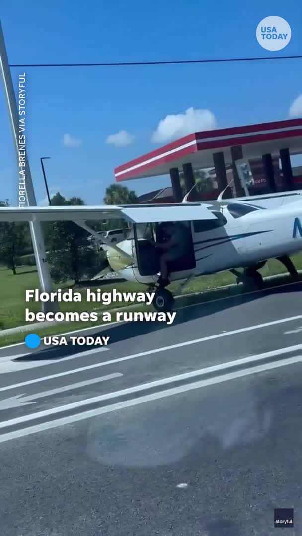 Cover for Watch as passenger walk from a small plane after an emergency landing on a Florida highway
