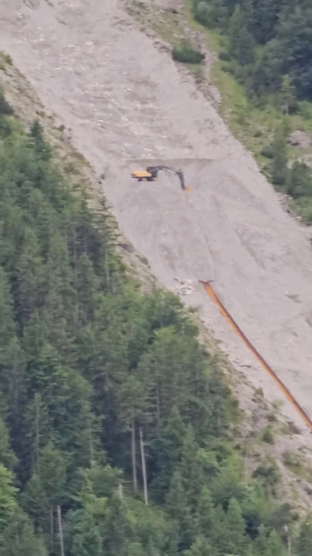 Cover for Watch this excavator take on a dangerously steep mountain in Bavaria! 🚧 #Engineering #Mountains #Fails #Germany