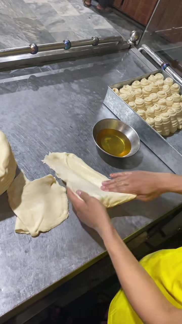 Cover for #OddlySatisfying Satisfying roll bread making 😋