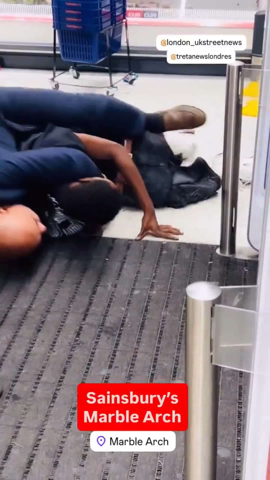 Cover for London — A migrant accused of shoplifting at a grocery store by Marble Arch is apprehended but then others come in the shop and hit the man restraining the suspect. The suspect escapes