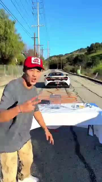 Cover for Table Pull Challenge With Exotic Car