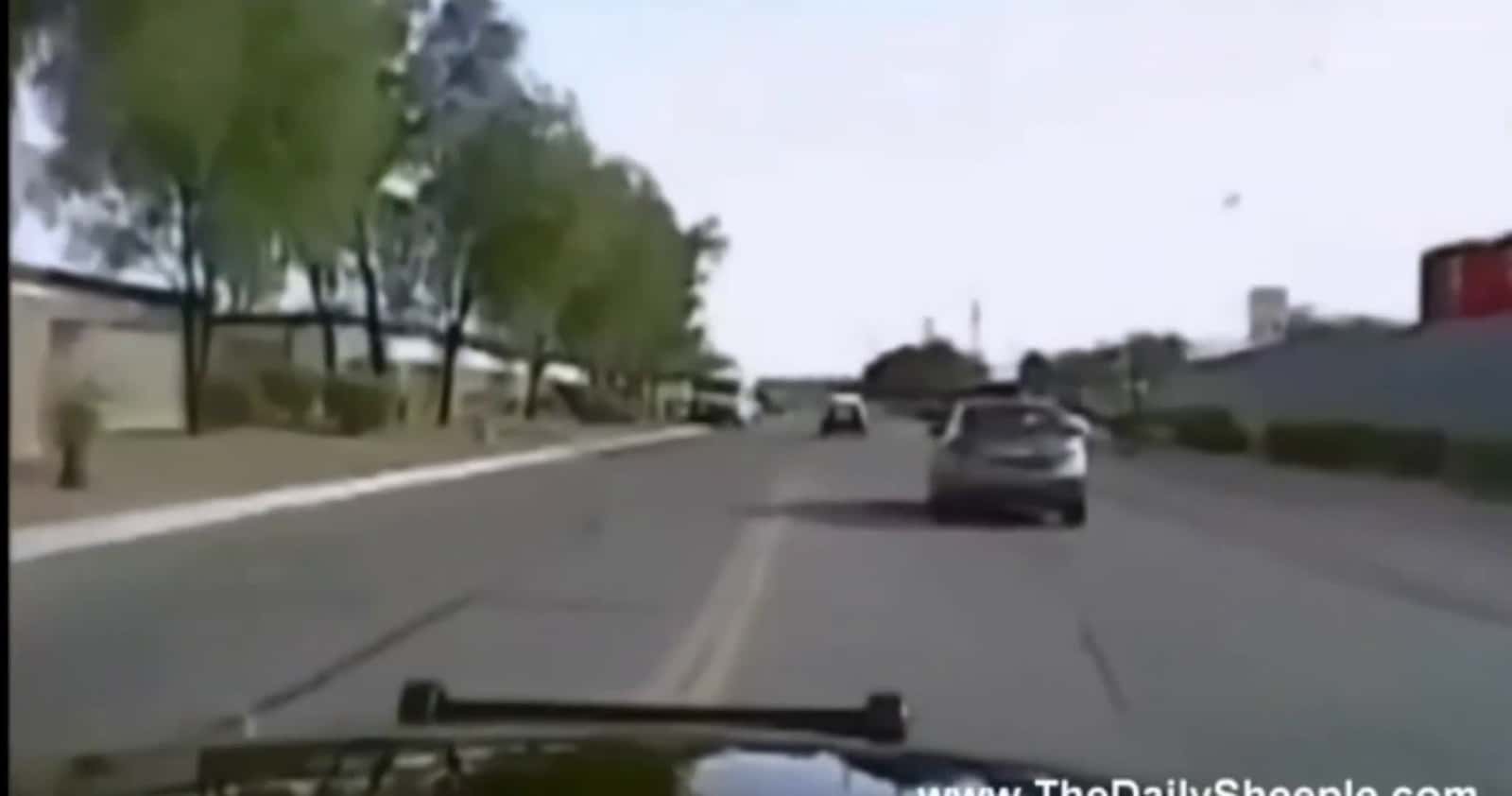 Cover for dashcam of police hitting a suspect with car