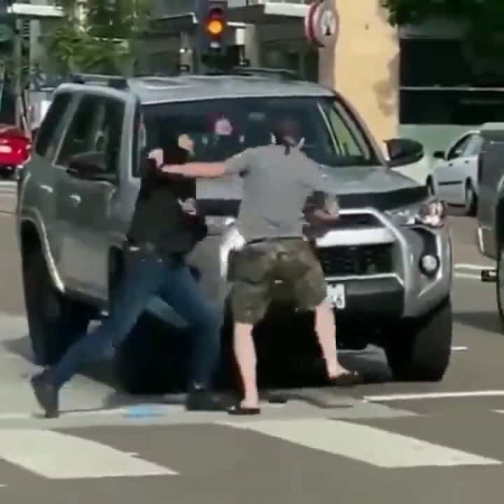 Cover for Two men fight in the road ends in brutal knockout  #fight