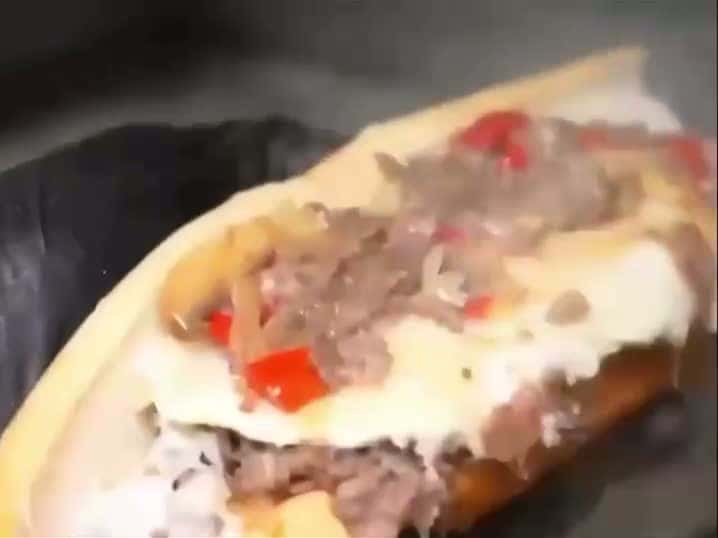 Cover for When the cheese pulls harmonize, you know it’s a symphony of flavor. Experience the delicious chorus of our cheesesteaks and loaded fries—melty, savory, and utterly satisfying 🍟🧀🔔 The Philadelphia Sandwich Co.🥖 Order online ...