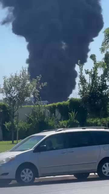Cover for A lot of black smoke in Stockton, California by French camp massive flame