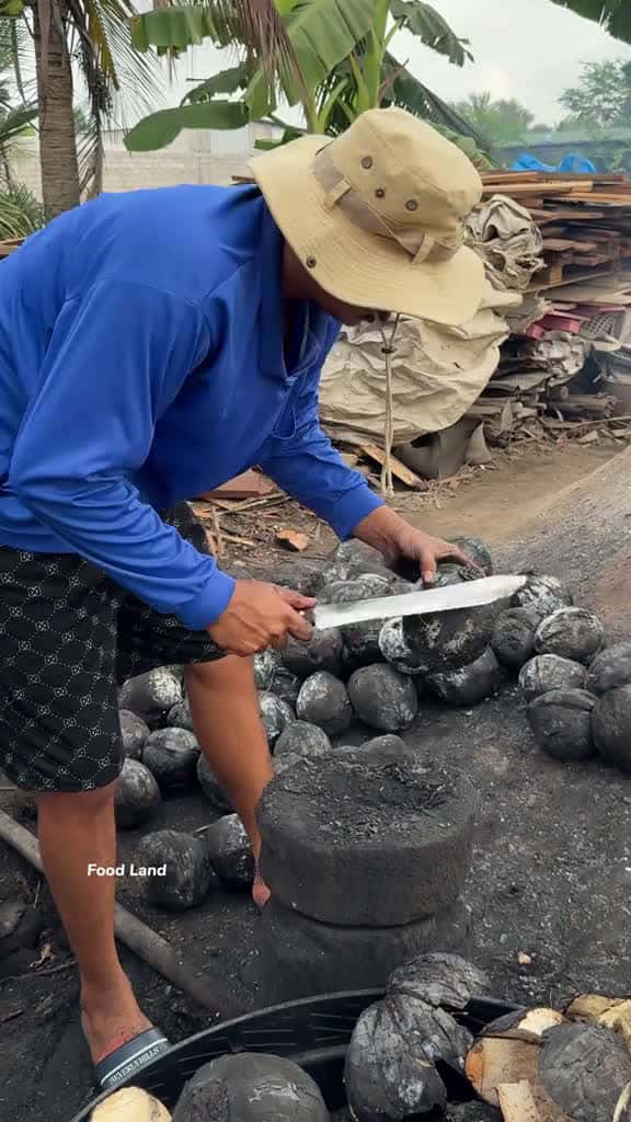 Cover for Incredible An expert peels a burnt coconut barehanded. . Shop name Location Saun som Ban p 72511 #followMe