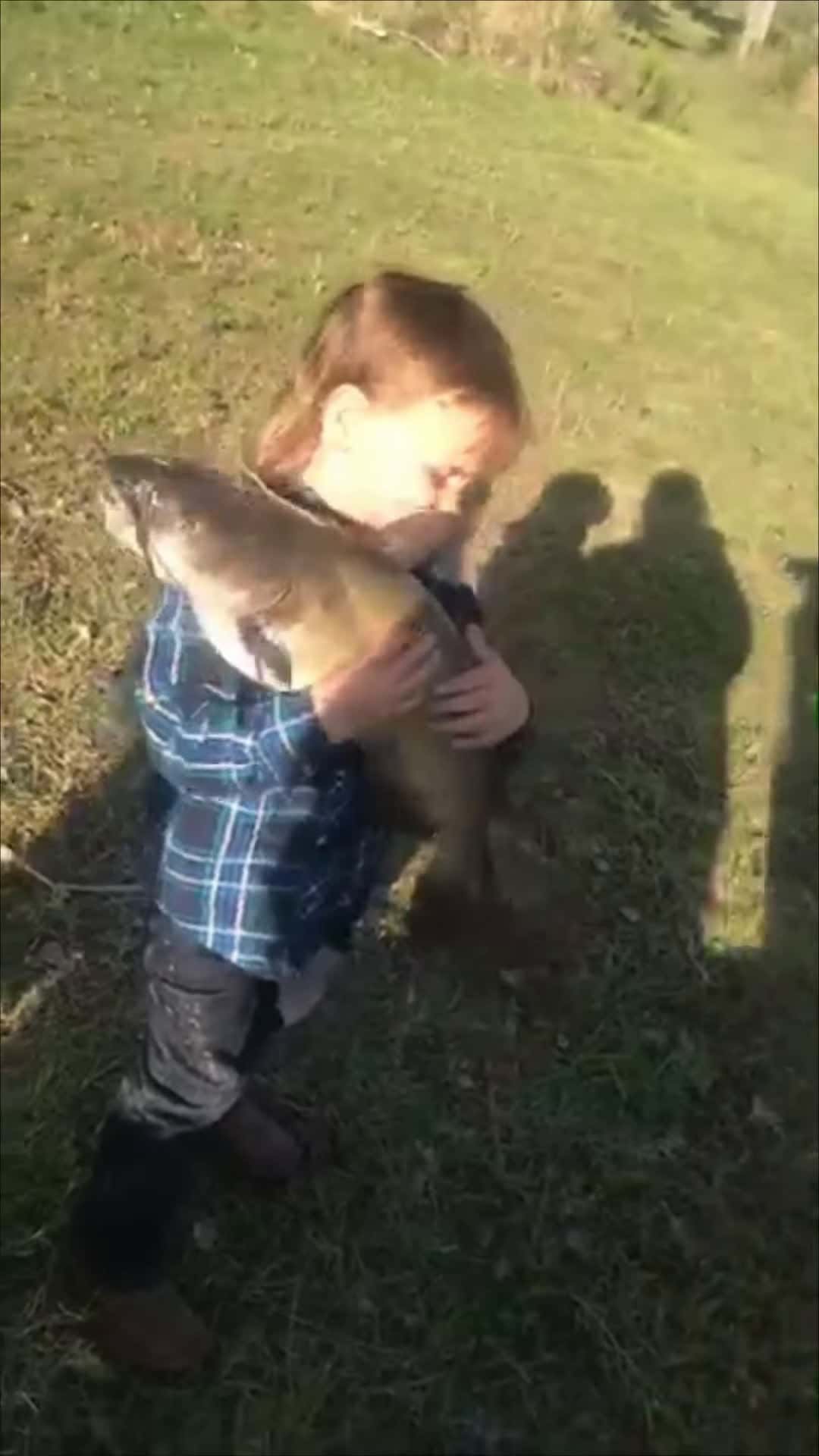Cover for #FirstVideoChallenge Catfish Disapproves Boy Holding It.