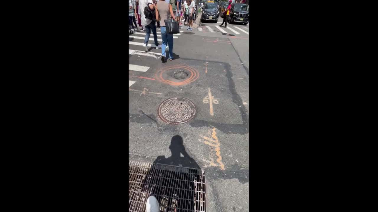Cover for NYC Pothole Emits Steam Like a volcano