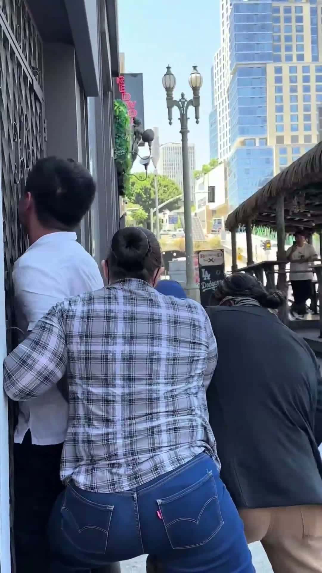 Cover for Viral video shows undercover ICE agents in plain clothes capturing a Chinese national in Los Angeles
