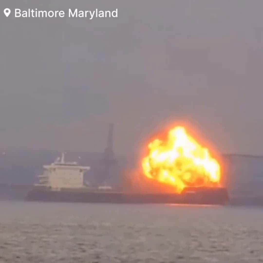 Cover for A massive explosion has occurred on a cargo ship near the Key Bridge in Baltimore Harbor