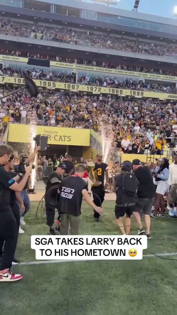 Cover for “You can do anything you want to do… especially if you’re from Hamilton!”  All love between SGA & his city at Hamilton Stadium to wrap up SGA Day! #NBA #Basketball #SGA #Shai #shaigilgeousalexander  created by NBA with NBA’s or...