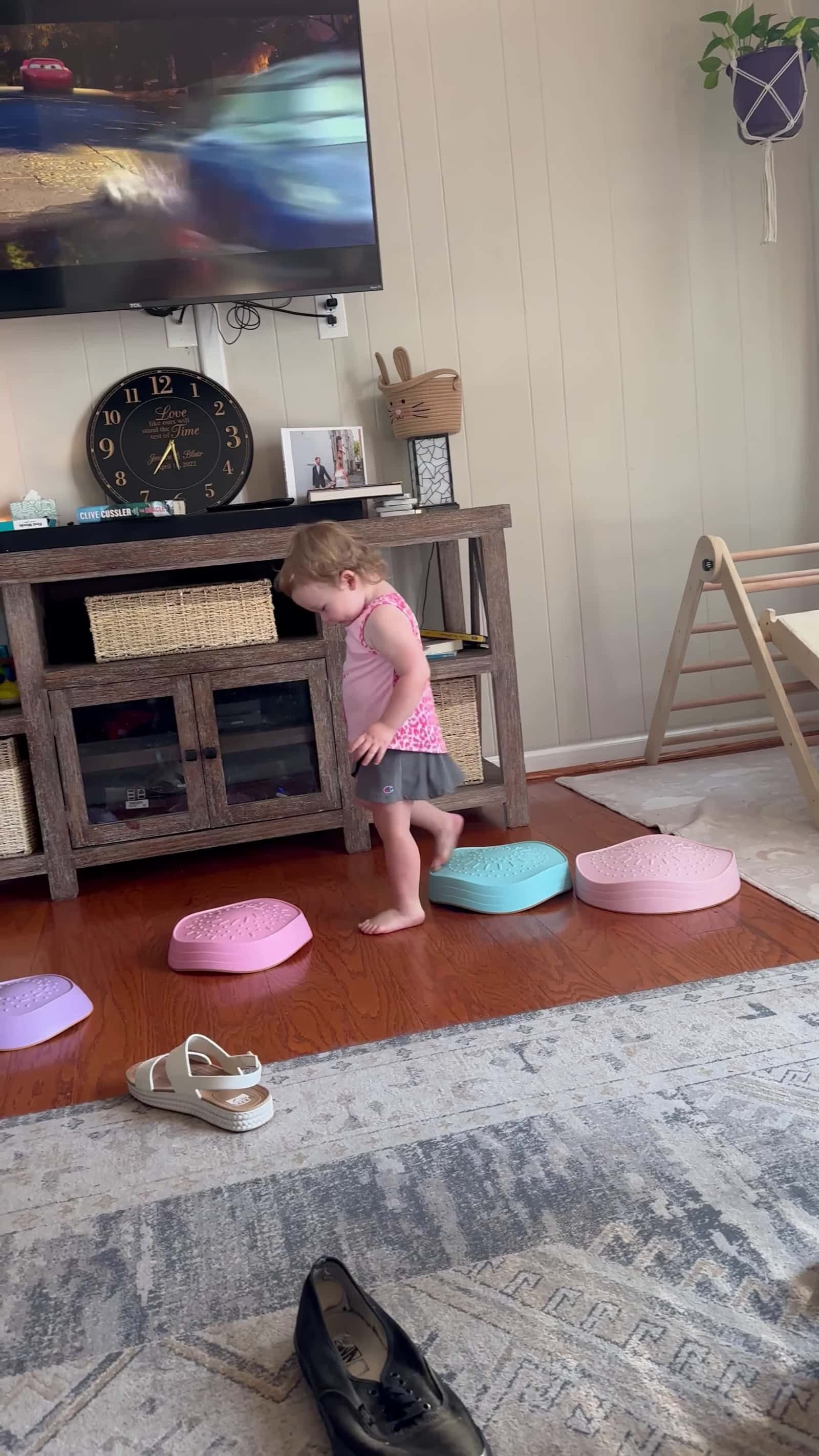 Cover for #FirstVideoChallenge Toddler Playfully Hits and Then Kisses Mother on the Couch.