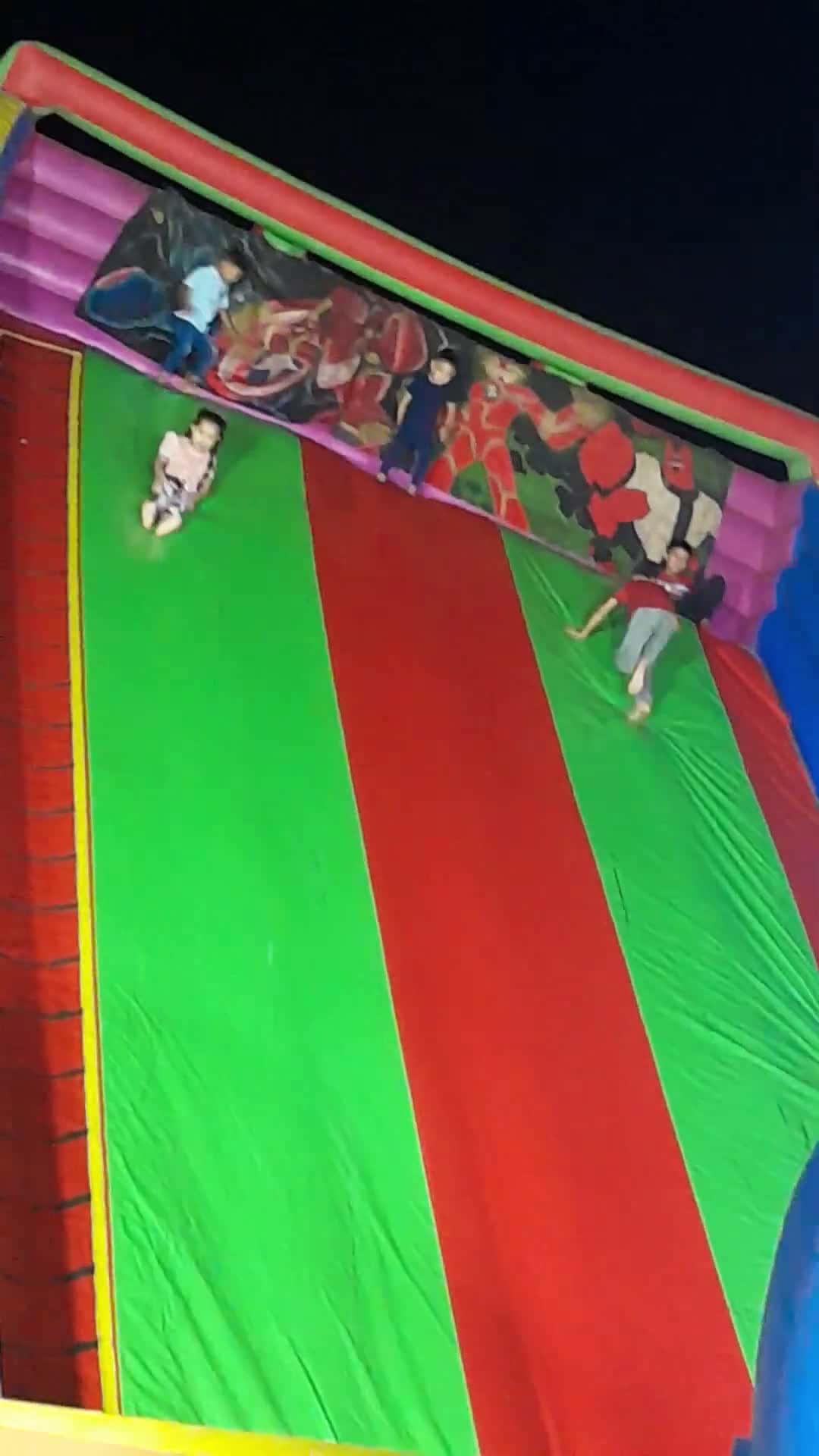 Cover for Boy Flips While Sliding on Big Bouncy Castle